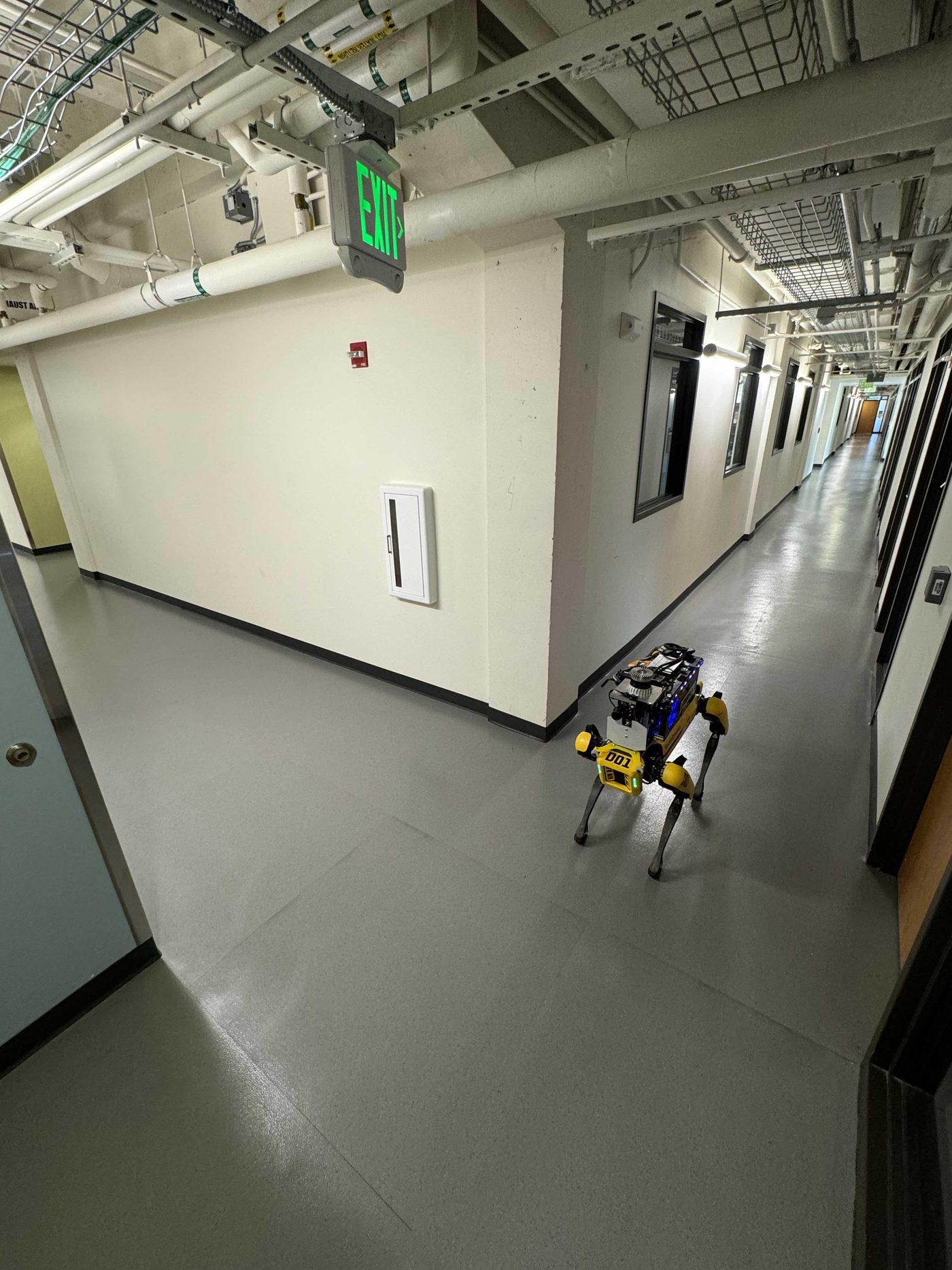 Unmapped hallways force robots into stop-and-go exploration.